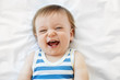 © Lisa Tichané - Portrait of laughing baby boy with open mouth