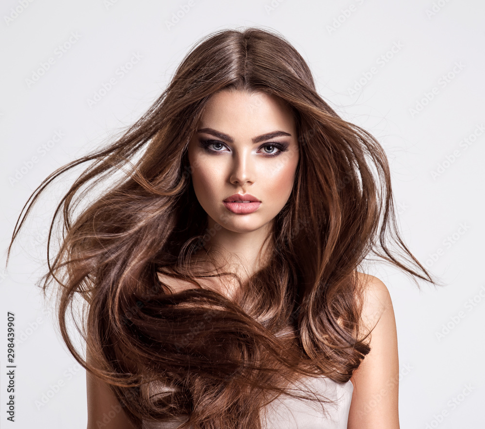 Portrait of a beautiful woman with a long hair. - obrazy, fototapety, plakaty 