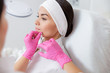 © Yakobchuk Olena - Pretty lady receiving beauty injection at spa salon