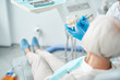 © Yakobchuk Olena - Senior woman is lying in dentist room