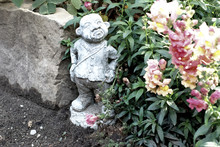 Statue In The Garden