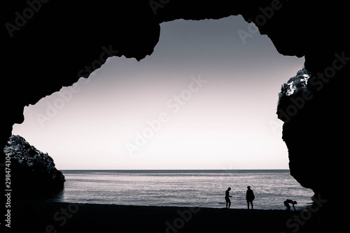 young-friends-are-throwing-stones-into-the-sea