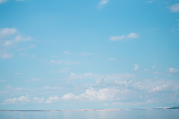 Wall Mural - Sea and sky with clouds.