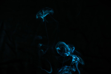 Smoke on a black background. Abstraction.