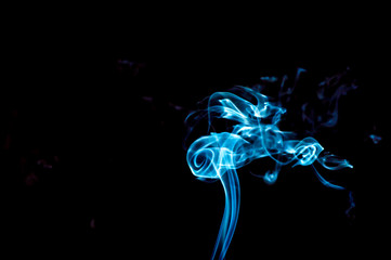 Smoke on a black background. Abstraction.