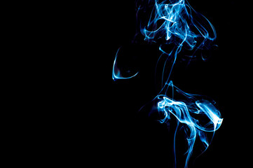 Smoke on a black background. Abstraction.