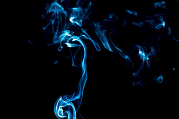 Smoke on a black background. Abstraction.