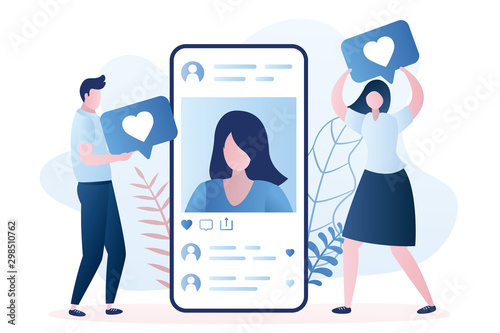 Fotografía Big smartphone with a woman avatar, male and female followers gives like