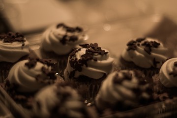 Sticker - Selective focus high angle shot of chocolate cupcakes with whipped cream