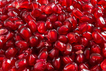 Background of red pomegranate seeds