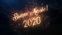 2020 Happy New Year Greeting Text In French With Particles And Sparks On Black Night Sky With Colored Fireworks On Background, Beautiful Typography Magic Design.