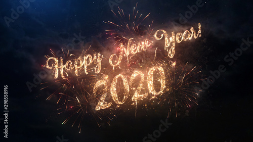 Fotografía 2020 Happy New Year greeting text with particles and sparks on black night sky with colored fireworks on background, beautiful typography magic design