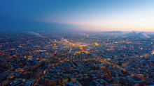 Beautiful Aerial View To Moscow City On The Sunset. Picturesque Motion Of The Evening Metropolis With Street And Building Lights Gradually Turning On And Colorful Sky On The Background.