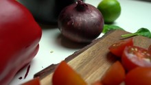 Slow Motion Over A Cutting Board Filled With Vegetables