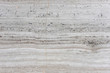 © tanarch - Travertine stone texture background. Interior material construction.