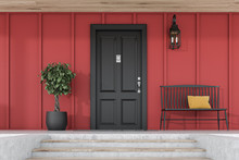 Black Front Door Of Red House With Tree And Bench