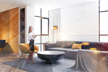 Blond woman in white and yellow living room corner