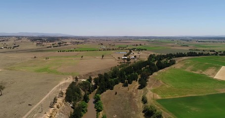 Wall Mural - Hunter River winding in a loop around remote agriculture farm cultivating crops due to fresh water irrigation from river in Australia.