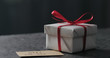 for you paper card next to white gift box on terrazzo countertop