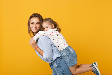 woman in light clothes have fun with cute child baby girl 4-5 years old. mommy little kid daughter i