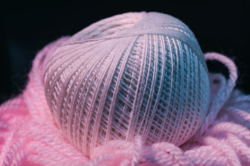 Poster - Close up beautiful tangle of thread in red and blue light on a dark background. Macro Photography view.