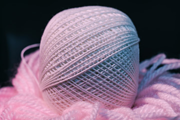 Poster - Close up beautiful tangle of thread in red and blue light on a dark background. Macro Photography view.