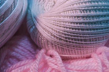 Poster - Close up beautiful tangle of thread in red and blue light on a dark background. Macro Photography view.