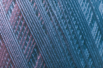Poster - Close up beautiful white thread in red and blue light background texture. Macro Photography view.