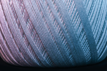 Poster - Close up beautiful tangle of thread in red and blue light background texture. Macro Photography view.