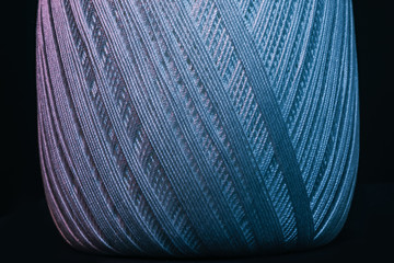 Poster - Beautiful tangle of thread in red and blue light background texture.