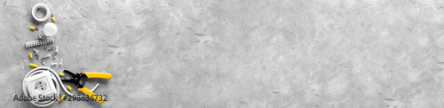 Fotografía Electrician's supplies on grey background