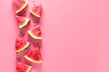 Poster - Slices of sweet ripe watermelon on color background