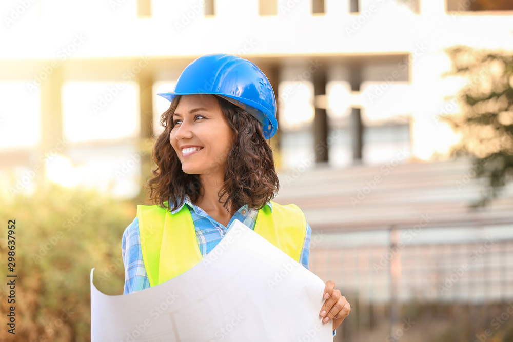 Portrait of female architect in building area
