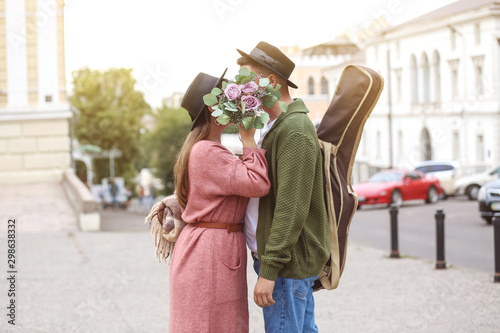 Happy young couple on romantic date outdoors Tableau sur Toile