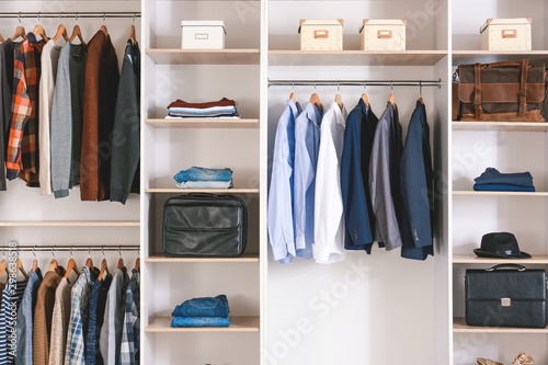 Fotografía Big wardrobe with clothes in dressing room