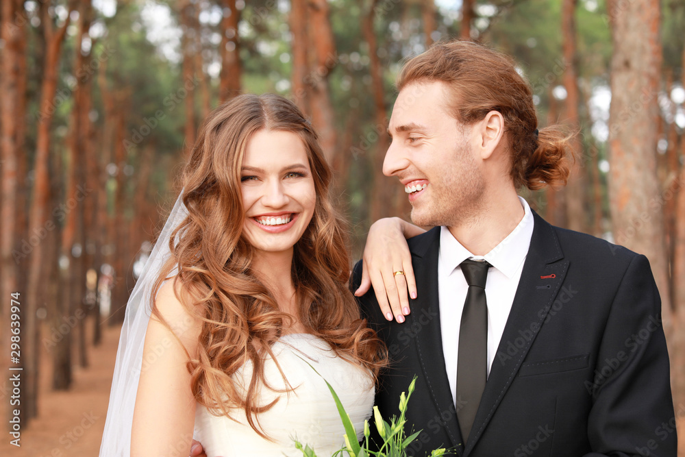 Happy couple celebrating their wedding outdoors