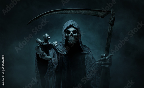 Cuadros en Lienzo Grim reaper reaching towards the camera over dark, misty background with copy sp