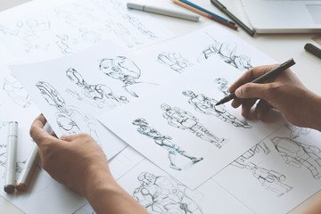 Wall Mural - Animator designer Development designing drawing sketching development creating graphic pose characters sci-fi robot Cartoon illustration animation video game film production , animation design studio.