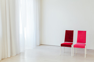 Canvas Print - two vintage chairs in an empty white room