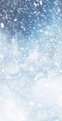 Abstract winter christmas background with shiny snow and blizzard. Space for text. Vertical for stories