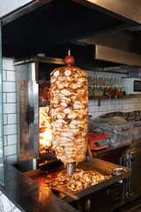 Wall Mural - Traditional Turkish Doner Kebab meat. Shawarma or gyros. Turkish, greek or middle eastern arab style chicken doner kebab food in restaurant.