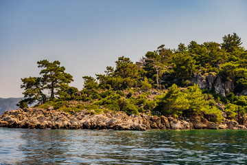 Rocks hills mountains island sea