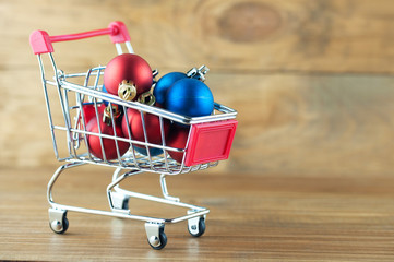 Wall Mural - Christmas toys in the shopping basket