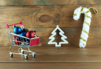 Wall Mural - Christmas toys in the shopping basket