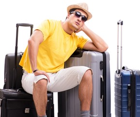 The happy young man going on summer vacation isolated on white