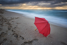 Prat Beach And Red Umbrella