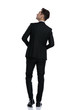 © Viorel Sima - back view of young elegant man walking and looking up