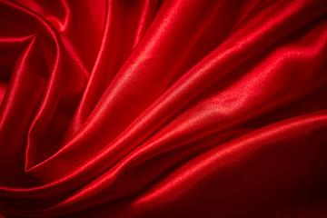 Wall Mural - Luxury red satin smooth fabric background for celebration, ceremony, event invitation card or advertising poster