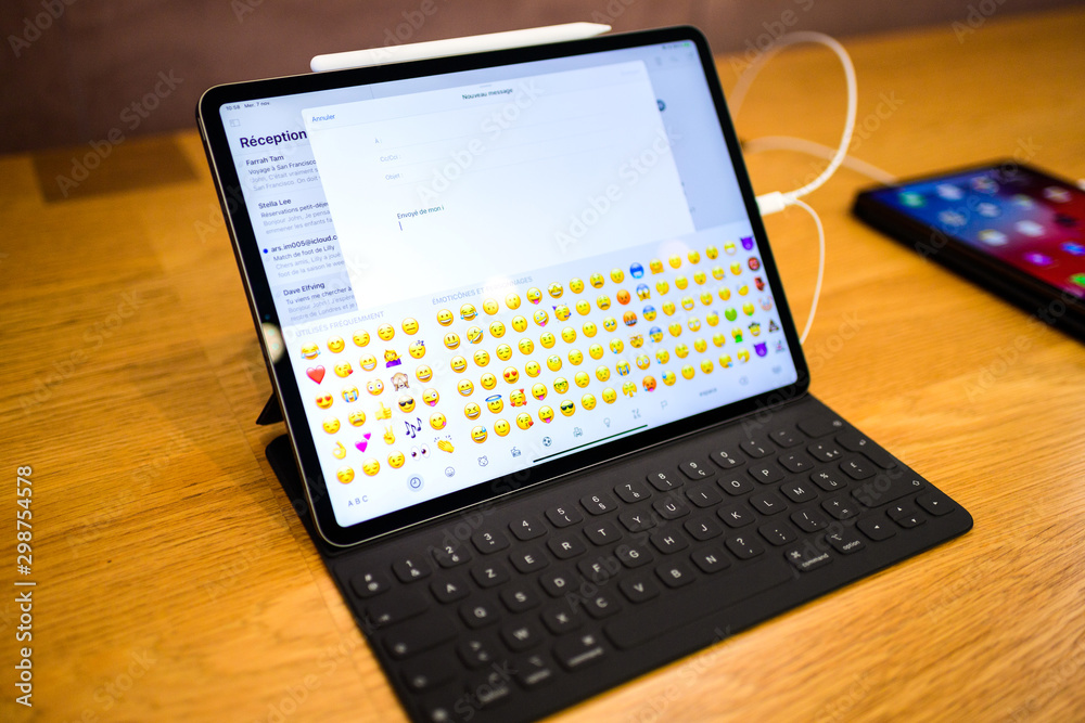 PARIS, FRANCE - NOV 7, 2018: All emoji emoticons on the new Apple iPad ...