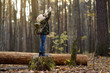 © Maria Sbytova - Little boy scout with spyglass during hiking in autumn forest. Child is looking through a spyglass.